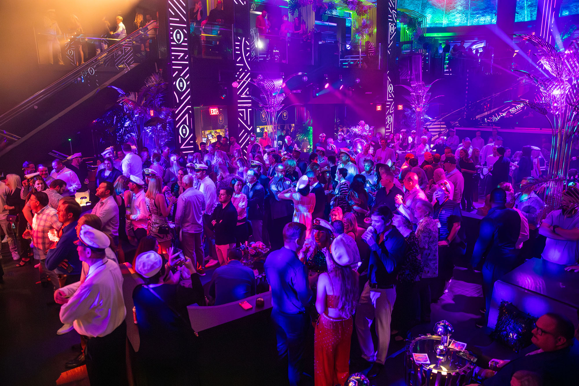 Guests filling the floor at the Playoff Premium Champions Party