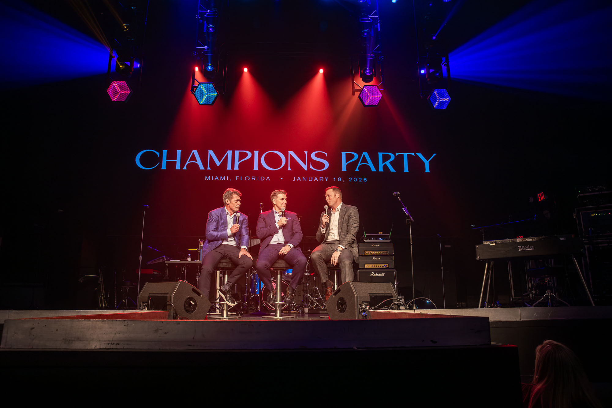 Chalk talk panel on stage at the Playoff Premium Champions Party